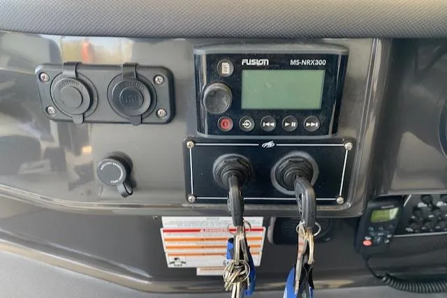 Slide: The Image of Control panel of a 2017 Monterey 378 SE boat with Fusion MS-NRX300 system. - 22