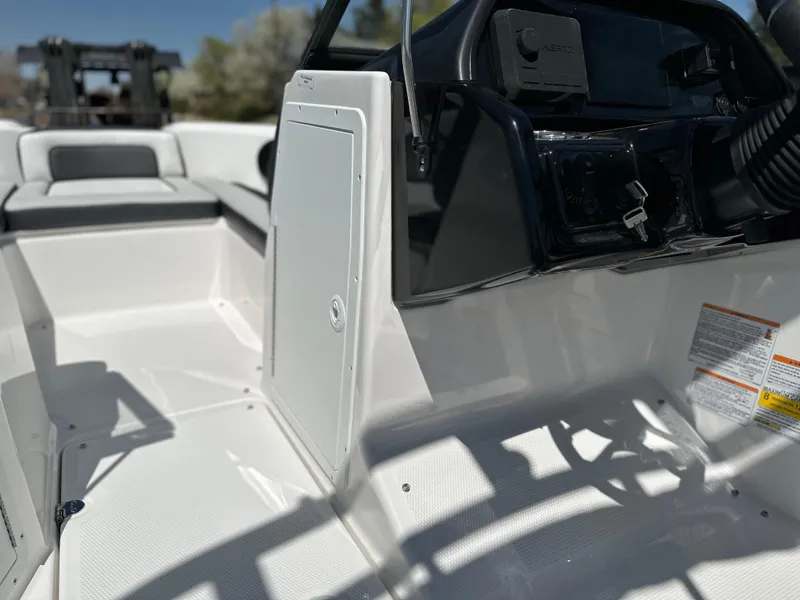 Slide: The Image of 2025 Yamaha Boats 195S interior, showcasing sleek design and modern controls. - 10