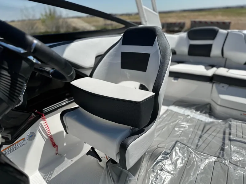 Slide: The Image of 2025 Yamaha Boats 195S interior with modern seating and sleek design. - 11