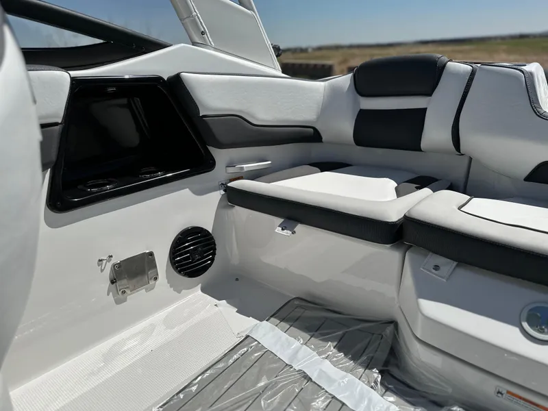 Slide: The Image of Interior of 2025 Yamaha Boats 195S, featuring sleek seating and modern design elements. - 14