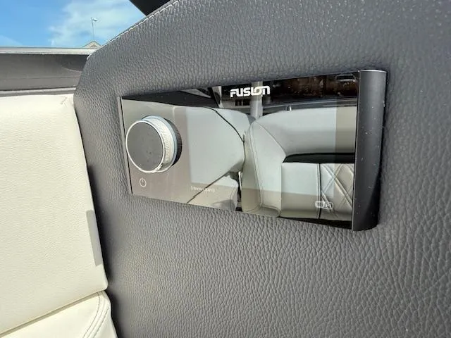 Slide: The Image of Storage compartment of a 2020 Regal LS6 Surf boat with a deflated gray bag. - 27