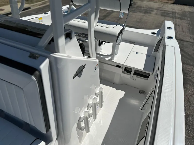 Slide: The Image of 2025 Yamaha Boats 222 FSH Sport interior, featuring sleek white seating and modern design elements. - 17