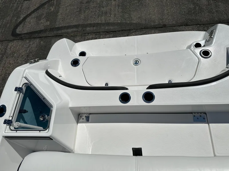 Slide: The Image of 2025 Yamaha Boats 222 FSH Sport deck, featuring sleek design and modern fittings. - 21