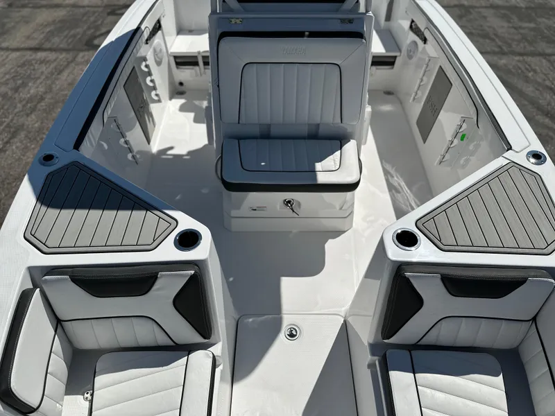 Slide: The Image of 2025 Yamaha Boats 222 FSH Sport interior, featuring sleek seating and modern design elements. - 8