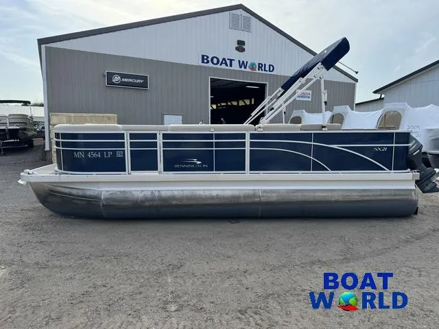 Slide: The Image of 2017 Bennington 21SSX Pontoon boat parked at Boat World dealership. - 12