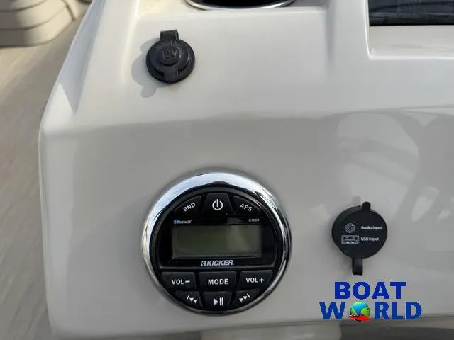 Slide: The Image of Control panel of 2017 Bennington 21SSX Pontoon with Kicker audio system and USB input. - 18