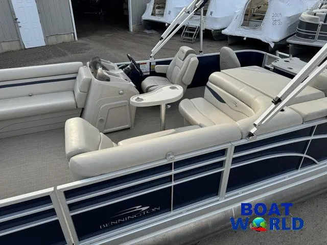 Slide: The Image of 2017 Bennington 21SSX Pontoon boat with spacious seating and modern design at Boat World. - 29