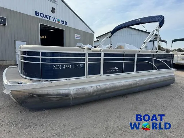 Slide: The Image of 2017 Bennington 21SSX Pontoon boat parked outside Boat World dealership. - 46