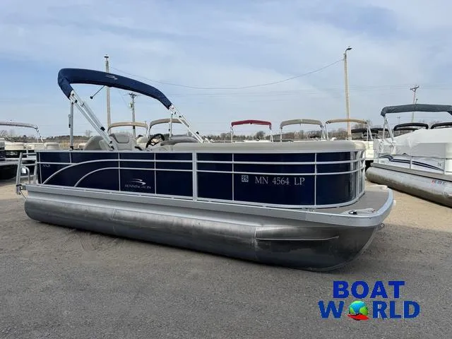 Slide: The Image of 2017 Bennington 21SSX Pontoon boat with blue exterior, displayed at Boat World dealership. - 49