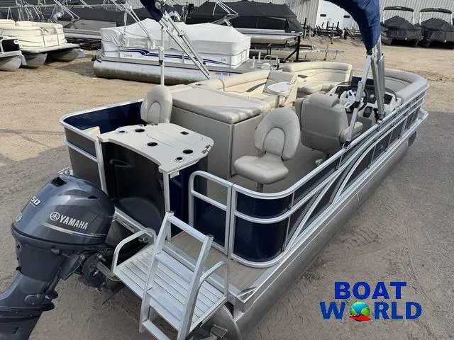 Slide: The Image of 2017 Bennington 21SSX Pontoon with Yamaha motor, displayed at Boat World dealership. - 6