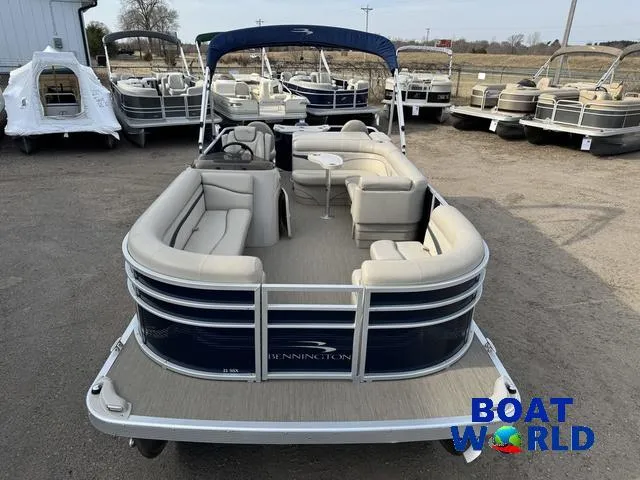Slide: The Image of 2017 Bennington 21SSX Pontoon boat with spacious seating, displayed at Boat World dealership. - 8