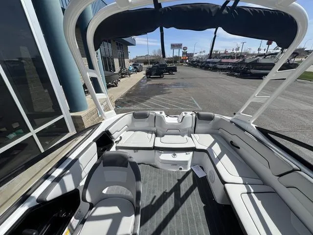 Slide: The Image of 2024 Yamaha Boats AR190 interior with spacious seating and modern design. - 15