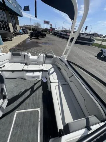 Slide: The Image of 2024 Yamaha Boats AR190 interior with spacious seating and modern design. - 16