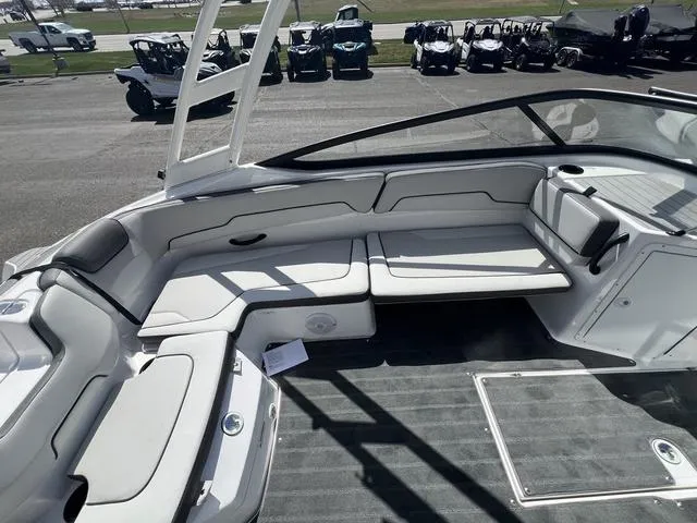 Slide: The Image of 2024 Yamaha Boats AR190 interior with spacious seating and modern design. - 18