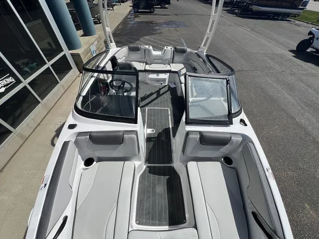 Slide: The Image of 2024 Yamaha Boats AR190 interior with sleek seating and modern design. - 21