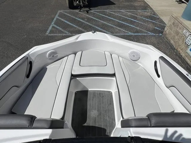 Slide: The Image of 2024 Yamaha Boats AR190 interior with sleek seating and modern design. - 24