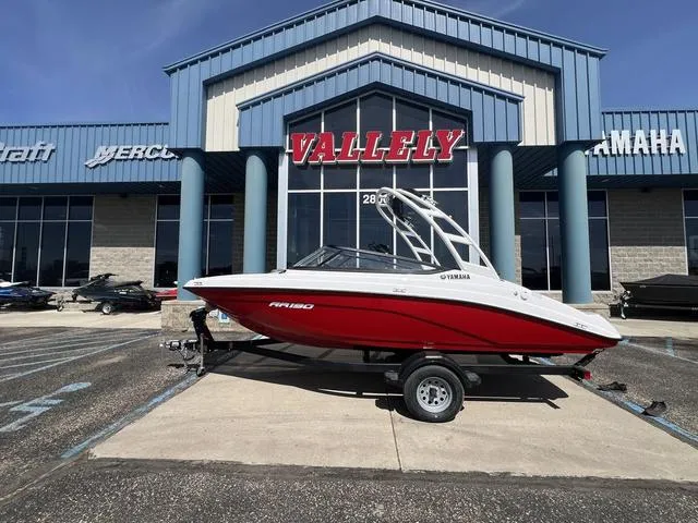 Slide: The Image of 2024 Yamaha AR190 boat in red, displayed outside a dealership. - 4