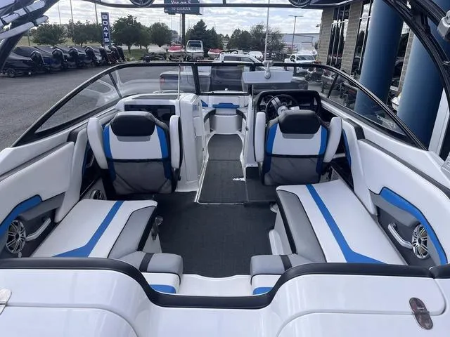 Slide: The Image of 2016 Yamaha Boats 242X E-Series interior with sleek seating and modern design. - 12