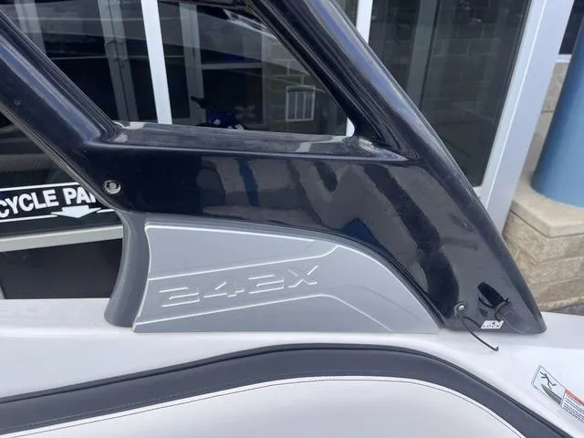 Slide: The Image of 2016 Yamaha Boats 242X E-Series detail, showcasing sleek design and branding. - 34