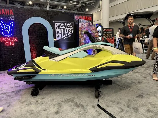 Slide: The Image of 2025 Yamaha WaveRunner JetBlaster Pro 3-Up on display at an indoor event. - 12