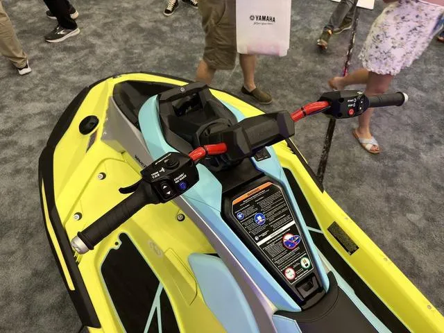 Slide: The Image of 2025 Yamaha WaveRunner JetBlaster Pro 3-Up with vibrant yellow and blue design. - 24