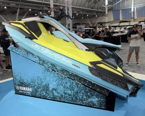 Slide: The Image of 2025 Yamaha WaveRunner JetBlaster Pro 3-Up displayed at a boat show. - 3