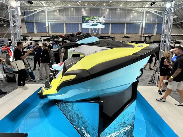 Slide: The Image of 2025 Yamaha WaveRunner JetBlaster Pro 3-Up on display at a boat show. - 4