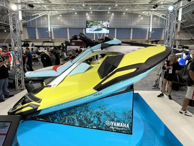 Slide: The Image of 2025 Yamaha WaveRunner JetBlaster Pro 3-Up on display at a boat show. - 5