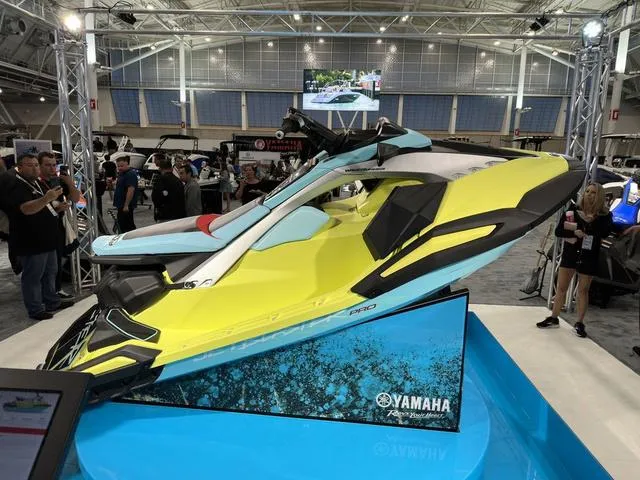 Slide: The Image of 2025 Yamaha WaveRunner JetBlaster Pro 3-Up on display at a boat show. - 6