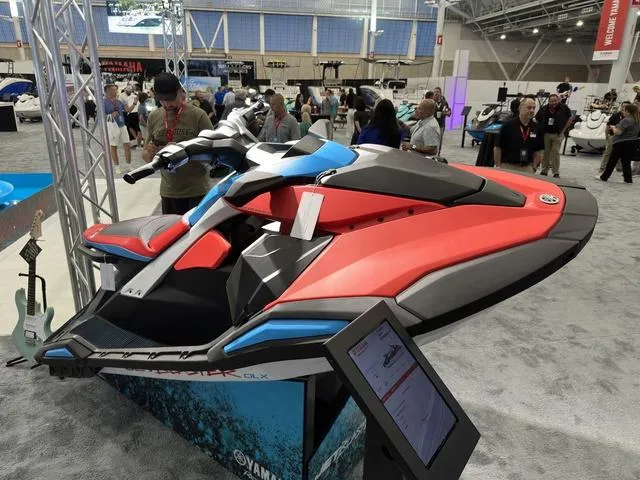 Slide: The Image of 2025 Yamaha WaveRunner Jetblaster on display at a boat show, featuring sleek design and vibrant colors. - 3