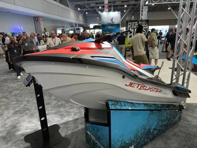 Slide: The Image of 2025 Yamaha WaveRunner Jetblaster on display at a crowded exhibition. - 4