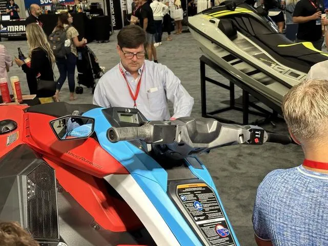 Slide: The Image of 2025 Yamaha WaveRunner Jetblaster on display at a crowded exhibition. - 8