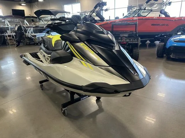 Slide: The Image of 2025 Yamaha Waverunner GP jet ski displayed in showroom, featuring sleek design and modern aesthetics. - 7