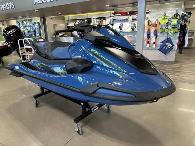 Slide: The Image of 2025 Yamaha Waverunner VX Cruiser HO in showroom, blue color, displayed on stand. - 3