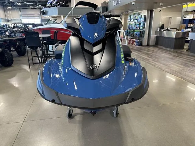 Slide: The Image of 2025 Yamaha Waverunners VX Cruiser HO in showroom, blue and black design. - 4