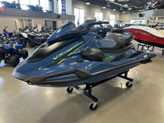 Slide: The Image of 2025 Yamaha Waverunner VX Cruiser HO in showroom, sleek blue design, ready for adventure. - 5