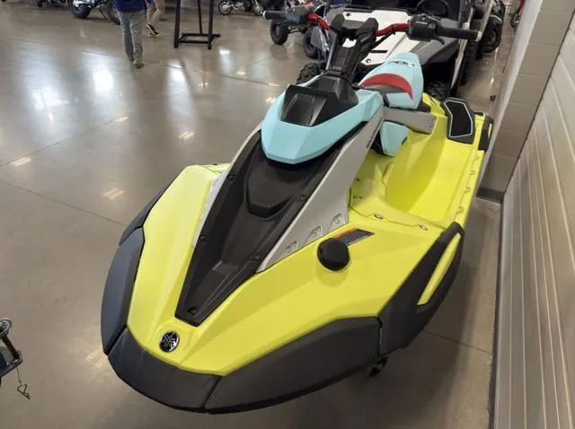 Slide: The Image of 2025 Yamaha Waverunner Jetblaster in showroom, featuring vibrant yellow and blue design. - 6