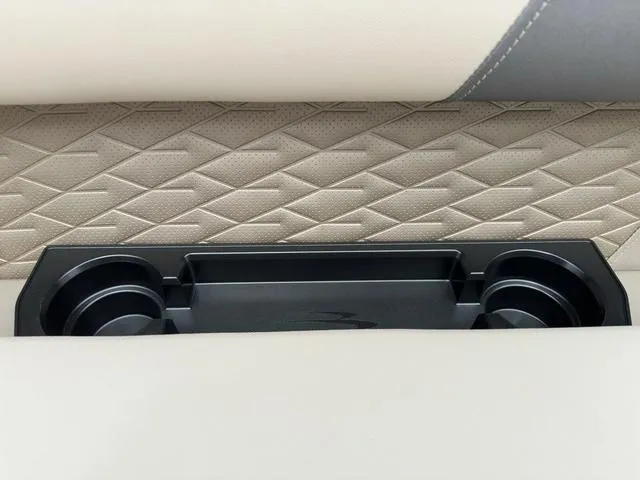 Slide: The Image of Cup holder and tray on 2024 Bennington 22 SSR Tri-Toon Pontoon with textured upholstery. - 18