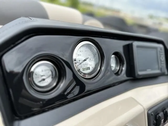Slide: The Image of Dashboard of 2024 Bennington 22 SSR Tri-Toon Pontoon with gauges and display. - 36