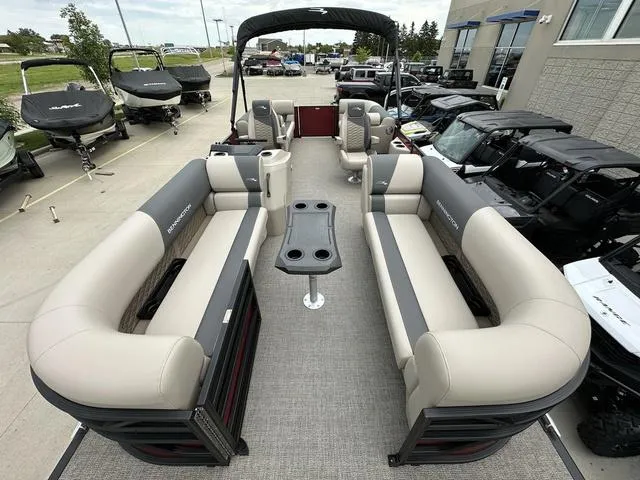Slide: The Image of 2024 Bennington 22 SSR Tri-Toon Pontoon with spacious seating and modern design. - 9