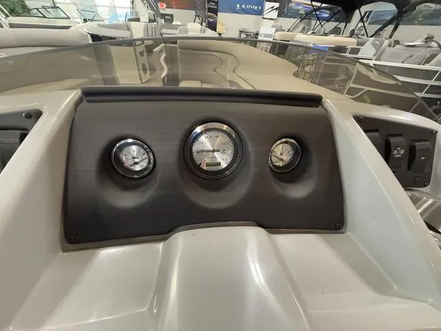 Slide: The Image of Dashboard of 2024 Bennington 208SLJ boat with gauges and controls. - 13