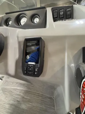 Slide: The Image of Dashboard of 2024 Bennington 208SLJ boat with gauges and controls. - 17