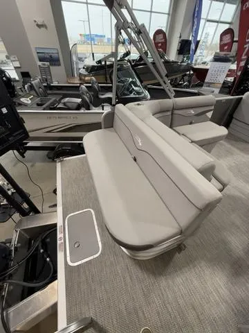 Slide: The Image of 2024 Bennington 208SLJ pontoon boat interior with gray seating and modern design. - 21