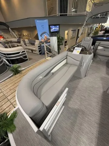 Slide: The Image of 2024 Bennington 208SLJ pontoon boat with sleek gray seating and modern design. - 3