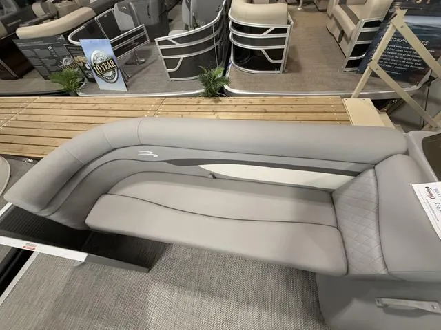 Slide: The Image of 2024 Bennington 208SLJ boat interior with sleek gray seating and modern design. - 6