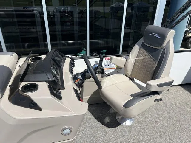 Slide: The Image of Captain's chair and helm of 2024 Bennington 22SSB-SPS pontoon boat. - 20