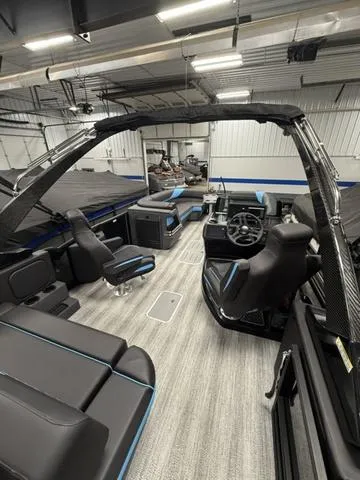 Slide: The Image of Bennington 24 MSB Arch Swingback Tri-Toon Pontoon 2025 - 28