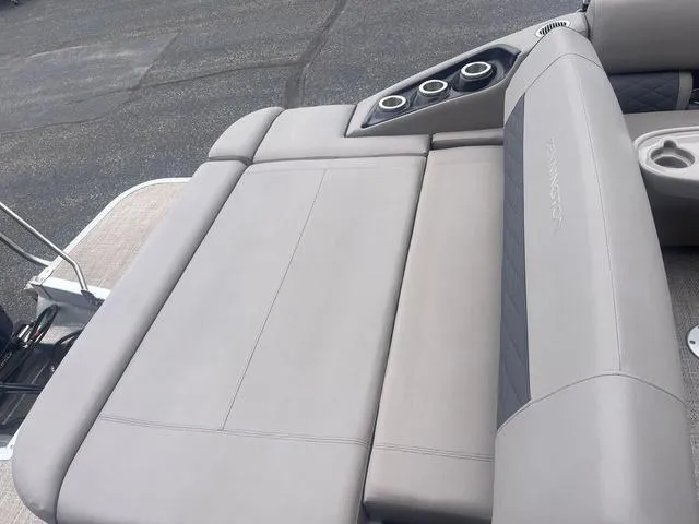 Slide: The Image of 2019 Bennington 23 SSBXP boat interior with gray seating and cup holders. - 8