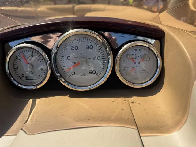 Slide: The Image of Dashboard of a 2010 Bennington 2250RCW Pontoon with speedometer and gauges. - 23
