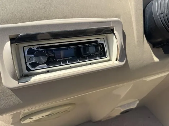 Slide: The Image of Kenwood stereo system in 2010 Bennington 2250RCW Pontoon boat dashboard. - 26